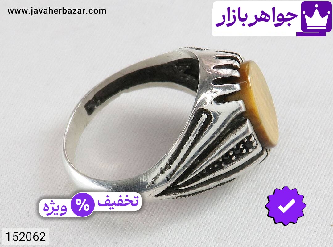 تصویر 2 انگشتر چشم ببر قهوهای با ضمانت اصالت جواهربازار عکس 2 انگشتر چشم ببر قهوهای اصل جواهربازار – مدل منتخب و موجود برای خرید