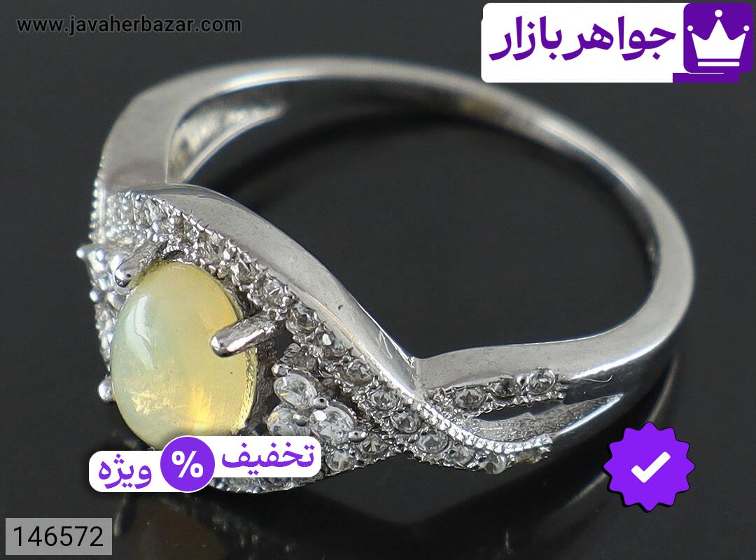 تصویر 1 انگشتر اپال زرد زنانه با ضمانت اصالت جواهربازار عکس 1 انگشتر اپال زرد زنانه اصل جواهربازار – مدل منتخب و موجود برای خرید
